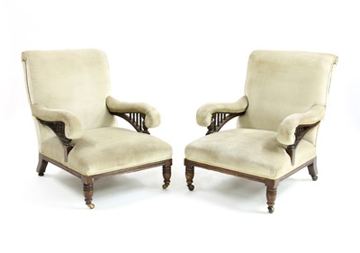 Lot 71 - A pair of walnut armchairs