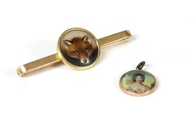 Lot 26 - A Victorian gold enamelled fox head brooch