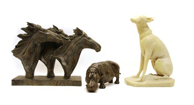 Lot 184 - A bronzed resin equestrian sculpture, and two further sculptures (3)