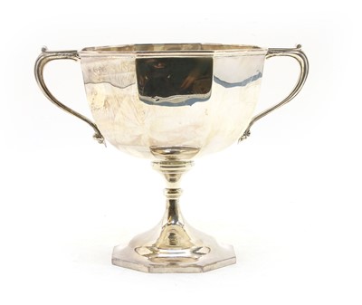Lot 34 - An octagonal twin handled silver trophy cup