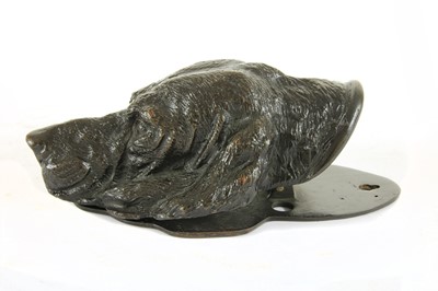 Lot 251 - A bronze paper clip in the form of a hound