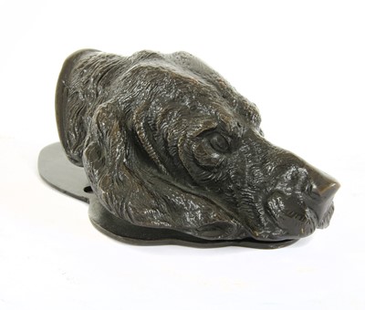 Lot 251 - A bronze paper clip in the form of a hound