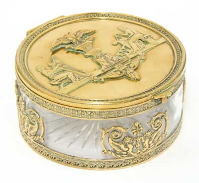 Lot 261 - A French Empire gilt metal mounted circular glass table box