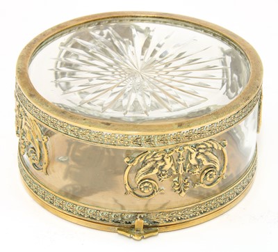 Lot 261 - A French Empire gilt metal mounted circular glass table box