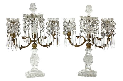 Lot 330 - A pair of cut-glass two-branch candlestick lustres
