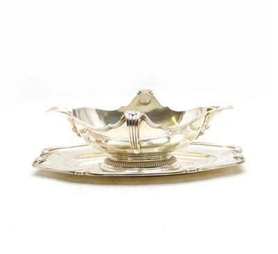 Lot 304 - A French sterling silver sauce boat