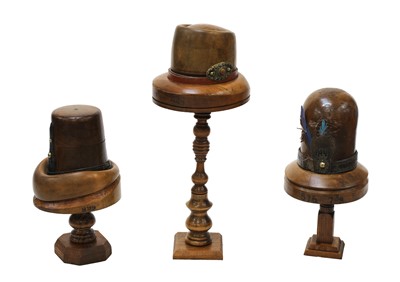 Lot 972 - Three Continental treen hat formers