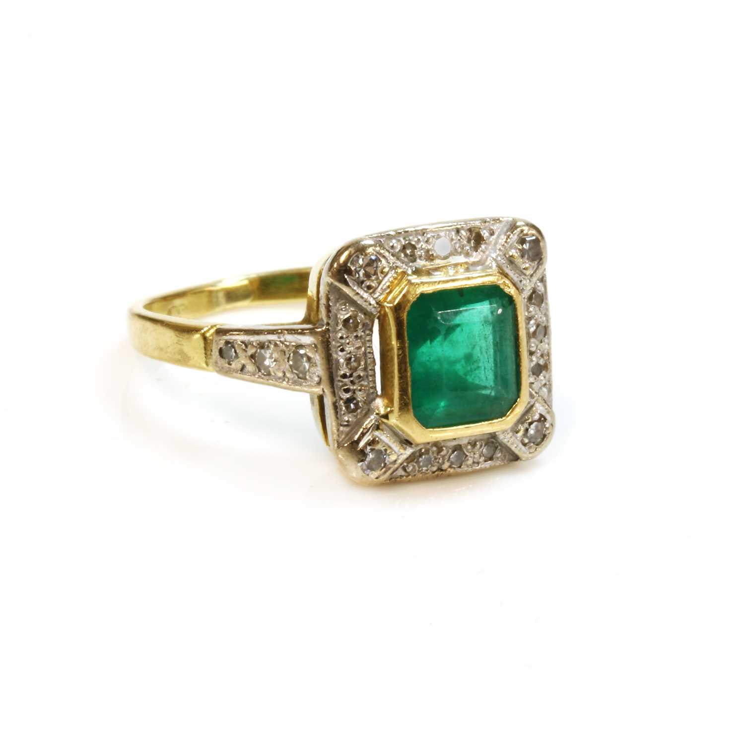 Lot 395 - An 18ct gold emerald and diamond square cluster ring