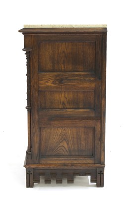 Lot 42 - A German carved oak side cabinet