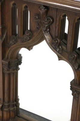 Lot 42 - A German carved oak side cabinet