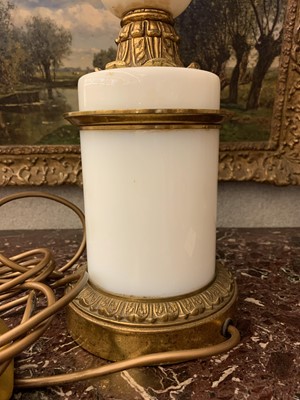 Lot 103 - A pair of opaline glass and gilt metal table lamps