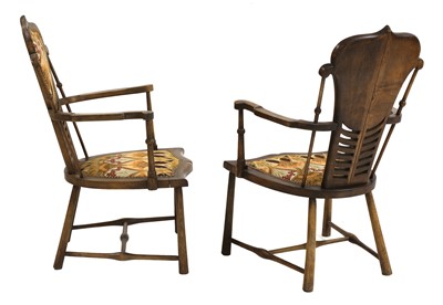 Lot 30 - A pair of Art Nouveau mahogany and beech armchairs