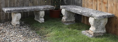 Lot 157 - A near pair of carved limestone garden seats