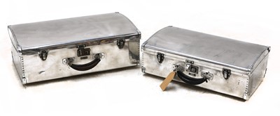 Lot 144 - Two graduated polished aluminium suitcases
