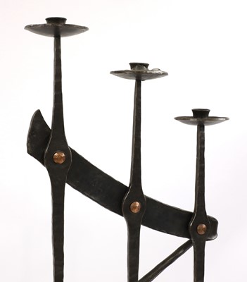 Lot 135 - A wrought iron three-branch standing candelabra