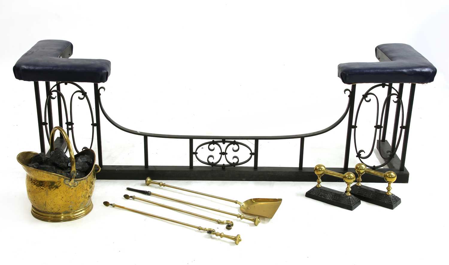 Lot 533 - A wrought iron club fender