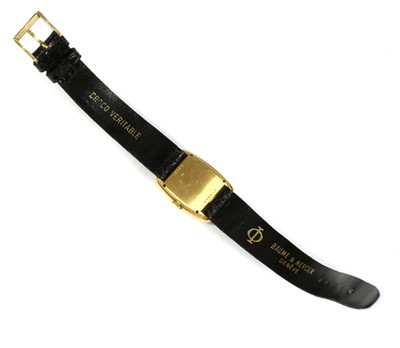 Lot 167 - A ladies' 18ct gold Baume & Mercier mechanical strap watch