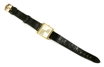 Lot 165 - A mid-size 18ct gold Bulova mechanical strap watch