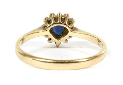 Lot 54 - A 9ct gold sapphire and diamond cluster ring