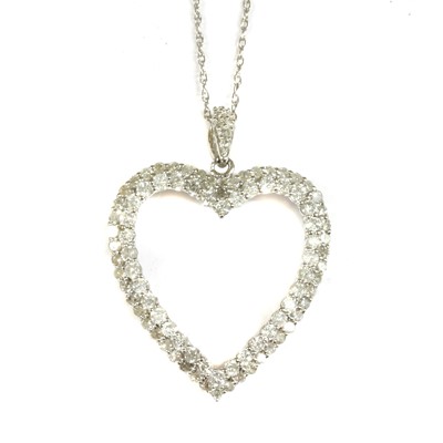 Lot 92 - A white gold diamond heart pendant