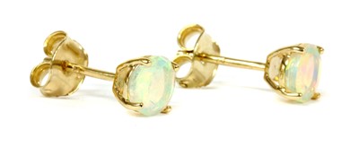 Lot 123 - A pair of gold opal stud earrings