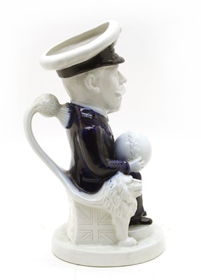 Lot 120 - A blue and white pottery Toby jug of George V