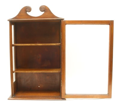 Lot 283 - A small Regency mahogany wall display cabinet