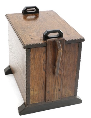 Lot 264 - An Arts and Crafts Cotswold School oak log box