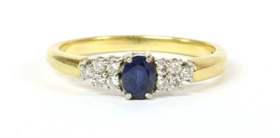 Lot 197 - An 18ct gold sapphire and diamond ring