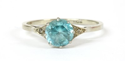 Lot 93 - A white gold blue zircon and diamond ring