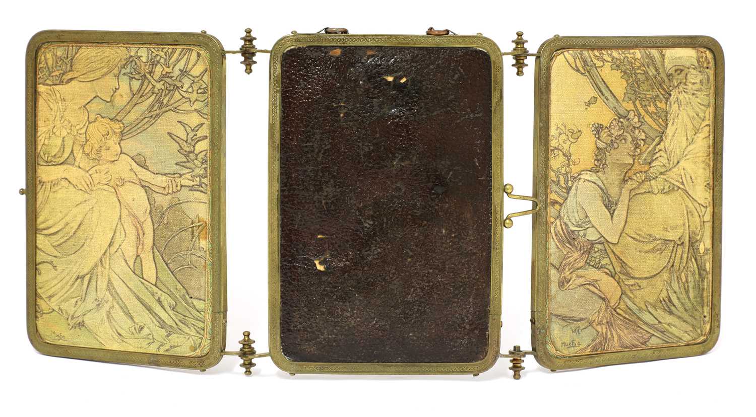 Lot 84 - A brass and embossed triptych mirror
