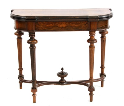 Lot 557 - A 19th century Continental figured walnut card table