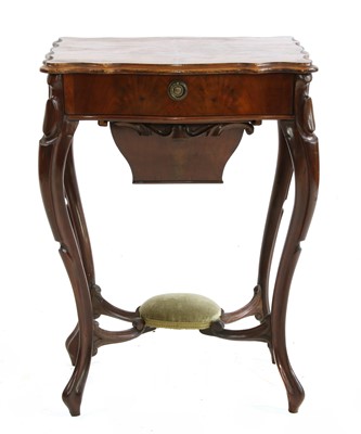 Lot 402 - A 19th century Continental mahogany work table