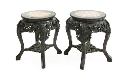 Lot 278 - A pair of Chinese carved hardwood stands