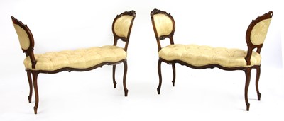 Lot 398 - A pair of Louis XV-style walnut window seats