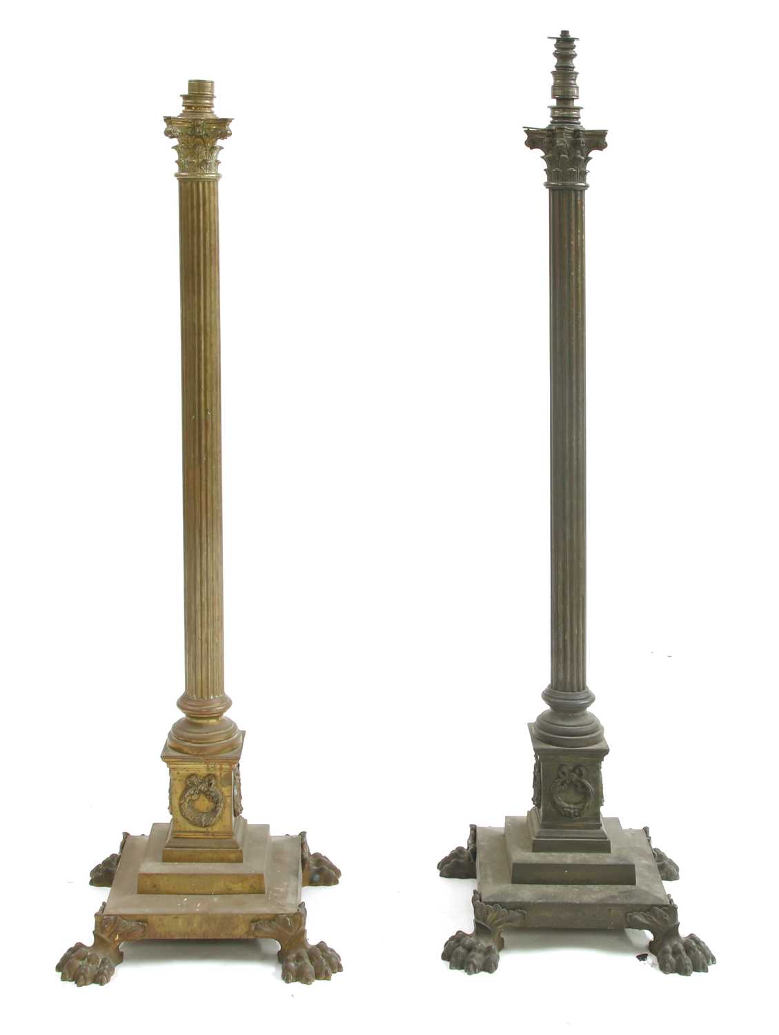 Lot 881 - A near pair of brass Corinthian column standard lamps