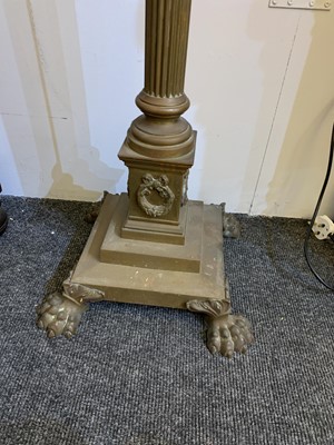 Lot 881 - A near pair of brass Corinthian column standard lamps