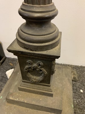 Lot 881 - A near pair of brass Corinthian column standard lamps