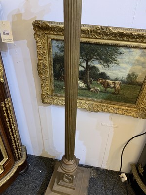 Lot 881 - A near pair of brass Corinthian column standard lamps