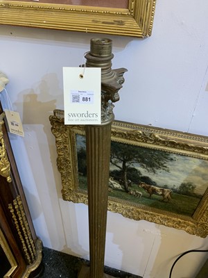 Lot 881 - A near pair of brass Corinthian column standard lamps