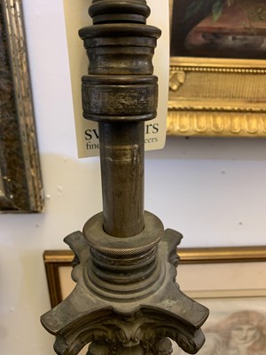 Lot 881 - A near pair of brass Corinthian column standard lamps