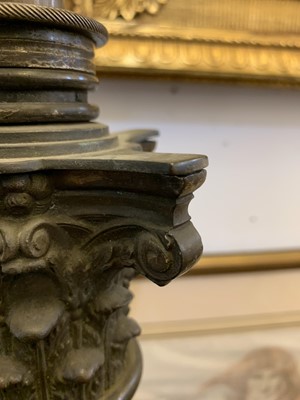 Lot 881 - A near pair of brass Corinthian column standard lamps