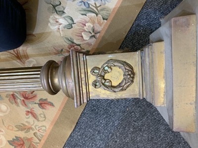 Lot 881 - A near pair of brass Corinthian column standard lamps