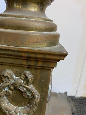 Lot 881 - A near pair of brass Corinthian column standard lamps