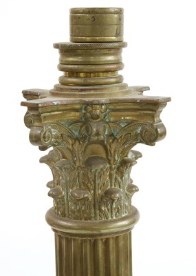 Lot 881 - A near pair of brass Corinthian column standard lamps