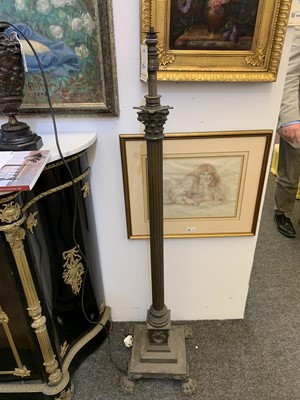 Lot 881 - A near pair of brass Corinthian column standard lamps