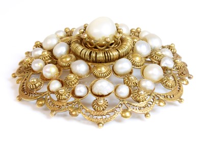 Lot 208 - A Continental gold-mounted pearl, shield-form, cluster brooch/pendant