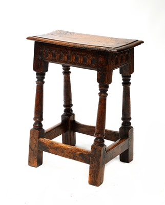 Lot 98 - An oak joint stool