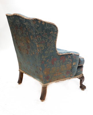Lot 47 - A silk upholstered wingback armchair