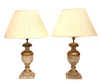 Lot 145E - A pair of turned and parcel gilt table lamps